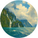 Circular painting of a mountainous landscape with waterfalls and blue sky.