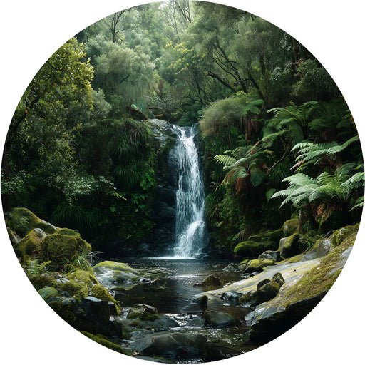 Circular image of a waterfall in a lush green forest