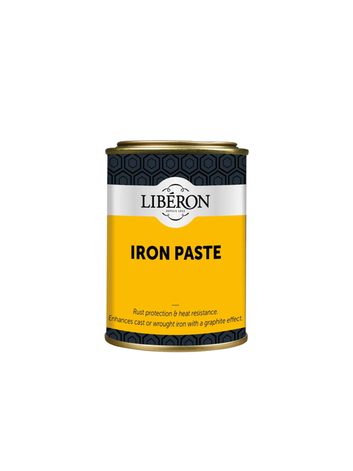 A cylindrical metal can of Liberon Iron Paste, used for decorative cast and wrought ironwork.